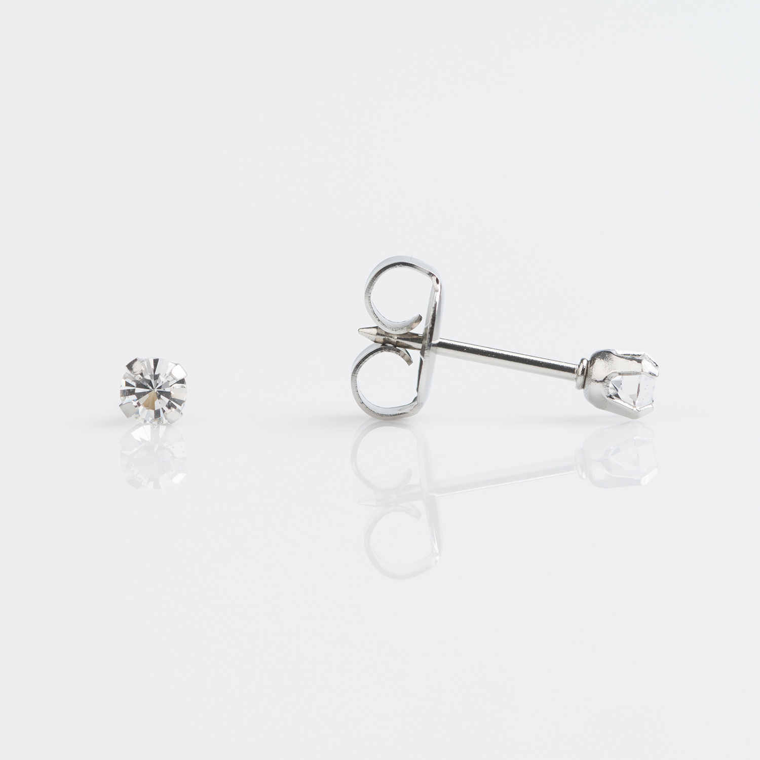 7512-0104 – Studex Stainless TIFF. 3mm April Crystal Piercing Earrings