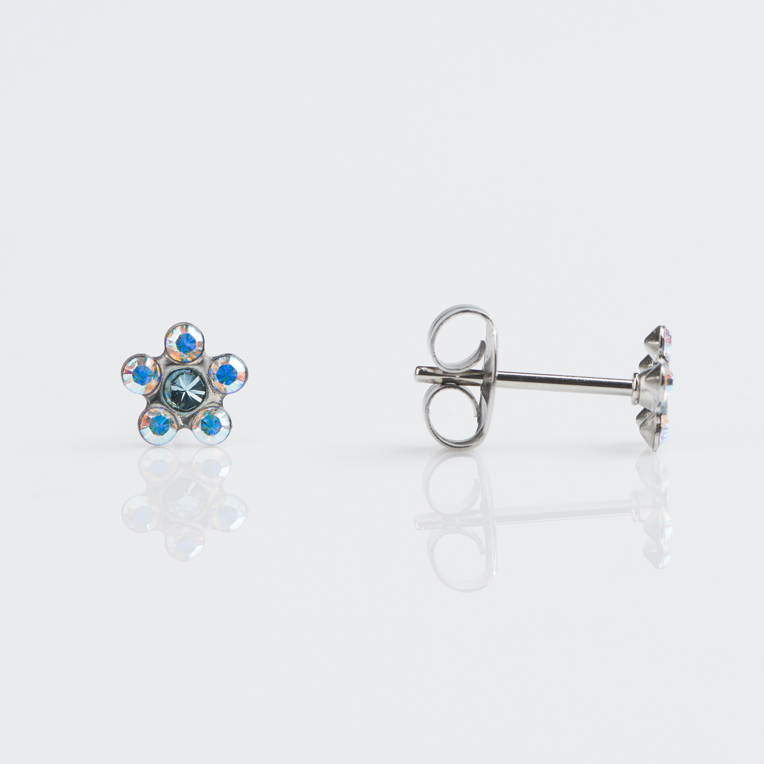 S6153WSTX – Studex Sensitive Stainless Daisy Ab Crystal Aquamarine Earrings