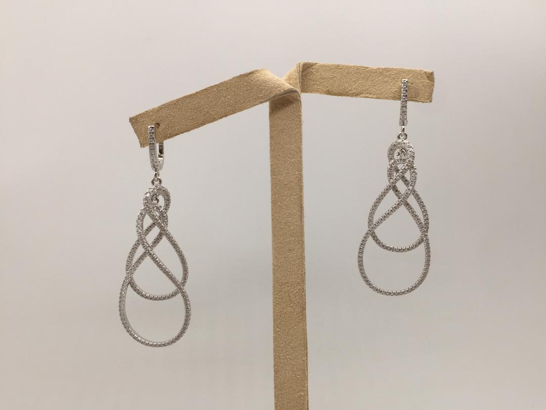 Sterling Silver Twisting Drop Earring Plated in Rhodium